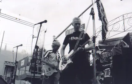 Day After Day performing onstage in 2002